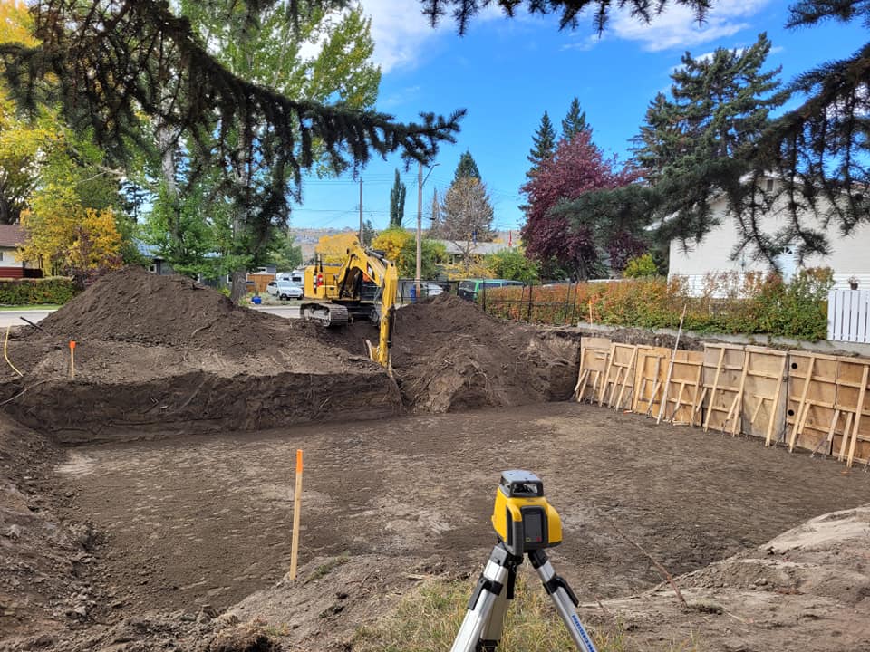 Calgary building Demolition, Calgary Excavation & Trenching, Calgary Landscaping, Calgary Retaining Walls & Patio Stones